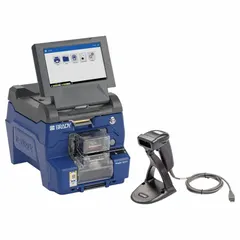 This wraparound label printer and applicator features 300 dpi printhead resolution and auto operation, producing up to 1,000 labels per day. It includes a USB cable, a printer ribbon (2 in x 150 ft, A62-R4300), and the Brady Workstation Product and Wire ID Software Suite. Typical applications include industrial wire and cable identification.