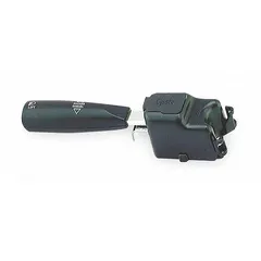 This GROTE turn signal switch operates on 12V DC with an 18 A current rating and includes tapered inserts with screws for mounting. It is used in automotive lighting systems to control left and right turn signals.