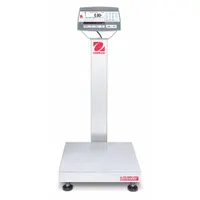 This OHAUS Defender 5000 bench scale features a stainless steel weighing surface (18 in x 18 in) and a column-mounted indicator for easy viewing. It offers a readability of 0.005 lb/2 g and is equipped with 2 In/4 Out Discrete I/O ports for integration into industrial weighing processes such as parts counting and checkweighing. Not IP rated