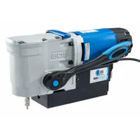 Low-profile magnetic drill press with fixed 320 RPM spindle speed, electric magnet, and Weldon spindle connection. Provides 1 1/2 in drill travel and operates on 110V AC. Suitable for industrial drilling applications requiring a compact, magnetic-base setup
