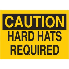 Adhesive-mounted polyester sign for marking areas where hard hats are required. Measures 3 1/2 x 5 inches, not retroreflective, with no glow-in-the-dark or anti-slip features. Suitable for indoor or covered environments where a permanent visual warning is needed.