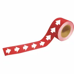 This coiled plastic pipe marker has a red background with white legend text to indicate directional flow. It measures 12 inches in width and 2 inches in length, supplied in a roll. Suitable for industrial pipe identification in facilities such as refineries, chemical plants, and manufacturing lines.