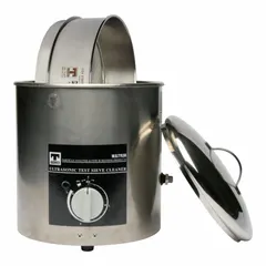 This stainless steel test sieve cleaner has a 9 1/2 in overall diameter and is designed for use with a compatible sieve shaker. It is used to remove lodged particles from sieve mesh, helping maintain accurate particle size analysis in laboratory sieving applications.