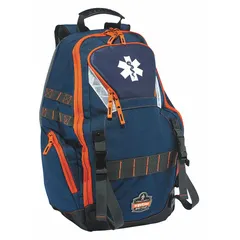 Blue polyester medic and trauma backpack with zipper closure. Interior volume of 1,465 cubic inches. Dimensions: 14 1/2 inches length by 5 inches width. Designed for carrying emergency medical supplies in field operations.