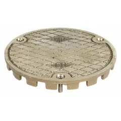 This floor cleanout cover provides access to plumbing drain lines for inspection and cleaning. It is made of cast iron with a bronze finish, has a 5-3/4 in overall diameter and 3-3/4 in overall height, and includes screws. The vandal-resistant construction helps prevent tampering in public areas.
