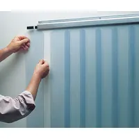 Strip door for commercial refrigerators and freezers. Acts as a flexible barrier to minimize cold air loss while allowing passage. Used in walk-in coolers and cold storage applications to help maintain consistent internal temperatures