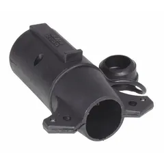Plastic adapter converting 7-way blade to 6-way round trailer wiring. Overall length 2 1/4 in. Used to connect trailers with different wiring configurations for lighting and brake signal compatibility.