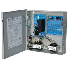 Steel-enclosed power supply board accepting 115V AC input and providing 6-15VDC output at 6A total current. Features 16 individually fused outputs for distributing power to multiple devices in security and access control systems.