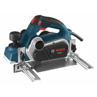 This corded hand planer operates at 120V AC with a 6.5 A motor delivering 16,500 RPM. It features a 3-1/4 in carbide blade width and a 1/8 in cutting depth. Used for smoothing and leveling wood surfaces, trimming doors, and removing material from edges in carpentry and renovation work