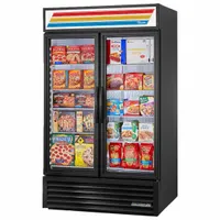 This convertible merchandiser from TRUE REFRIGERATION can operate as a refrigerator or freezer, suitable for commercial display and storage of packaged food and beverages. It features a black glass door for product visibility and uses R-290 refrigerant. Dimensions: 78 5/8 in height, 47 1/8 in width, 29 7/8 in depth
