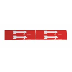 This vinyl pipe marker displays a directional flow arrow with a red background and white legend text. It is 7 inches wide and 1 1/8 inches long, suitable for indicating flow direction on industrial piping systems. The non-reflective material is designed for indoor use on pipes.