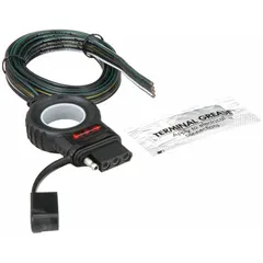 This 4-way flat electric connector is used for towing applications to connect trailer lighting systems, including turn signals, brake lights, and tail lights, to a tow vehicle. It features a PVC housing and includes a dust cover and grease for protection against moisture and corrosion. The connector uses 16 gauge wire and is suitable for fleet and vehicle maintenance tasks.