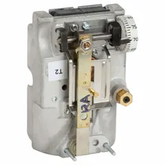 Single-temperature pneumatic thermostat with reverse action, designed for vertical mounting. Controls temperature from 55° to 85°F using two high-volume pipes for air flow output. Suitable for regulating pneumatic actuators or valves in HVAC systems.