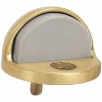 Floor-mounted dome door stop in bronze. Prevents doors from swinging too far and damaging walls or fixtures. Width 1 13/16 in, overall height 1 1/8 in. Suitable for commercial and industrial applications