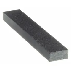 Dressing stick for truing and cleaning dish and flaring cup grinding wheels. Removes loaded material and restores wheel geometry to improve grinding performance and surface finish. Dimensions: 3" length, 1/2" width, 1/4" height.