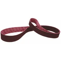This SCOTCH-BRITE surface-conditioning belt is 9 inches wide by 60 inches long, made with aluminum oxide abrasive in medium grade on a scrim backing. It is used for deburring, blending, and finishing on all metals