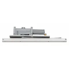 This Grade 1 heavy-duty concealed-mount door closer is constructed of aluminum and features a non-hold open track arm with adjustable spring size 6. It is ADA compliant and suitable for both interior and exterior applications. Typical uses include controlling door closing speed and force in commercial or institutional settings.
