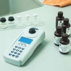 The LOVIBOND MD640 is a multiparameter colorimeter with 430 nm and 660 nm wavelengths and a resolution of 0.005 A. It features a digital display and includes three 24 mm vials. This instrument is configured for testing DEHA parameters, commonly used in water analysis and industrial process fluid monitoring.