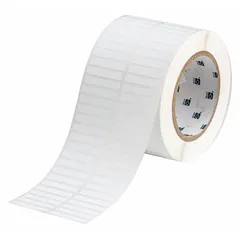 Precut label rolls measuring 1/4 in x 1 1/2 in with a 1/4 in core, white matte finish. Destructible material leaves visible evidence pattern upon removal, deterring tampering. Compatible with Brady i5100 printer series. Used for asset identification and tamper-evident sealing of equipment or enclosures.