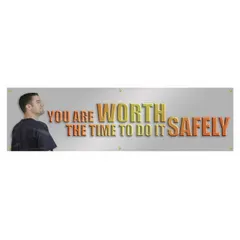 Indoor/outdoor banner made of poly sheeting with one printed side. Measures 28 in x 96 in. Does not include wind slits. Used to display safety messages in industrial workplaces.