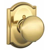 Brass dummy knob lockset in Camelot style. Designed for doors that do not require a locking function, such as closet or passage doors. Suitable for interior applications where decorative trim is needed