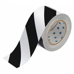 This polyester floor marking tape features a striped black/white pattern for high-visibility warning. With an 8 mil thickness and no legend, it is suitable for marking aisles, hazards, and work zones in industrial facilities.