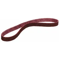 This SCOTCH-BRITE SC-BL surface-conditioning belt is 2 inches wide by 19 inches long, constructed with aluminum oxide abrasive in medium grade on a polyester backing. It is used for deburring, blending, and finishing operations on all metals, removing imperfections and creating a uniform surface finish without altering part geometry
