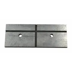 Grooved jaw plate for machine vises, featuring a serrated gripping surface to securely hold round or irregular workpieces. Used in milling, drilling, and grinding operations in metalworking and industrial maintenance.