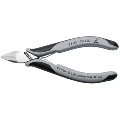 Flush, straight, narrow cutters with 5/8 in jaw length and 5 1/4 in overall length. ESD-safe handles dissipate static charge for use on sensitive electronic components. Precision-ground edges produce clean, burr-free cuts on soft wire up to 1.0 mm. Suitable for PCB assembly, component lead trimming, and telecommunications work.