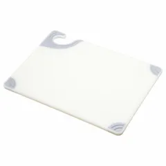 White co-polymer cutting board measuring 9 inches wide by 12 inches long. NSF certified for sanitation in commercial food preparation environments. The non-porous material resists knife scarring and bacterial growth, suitable for high-volume kitchen use.