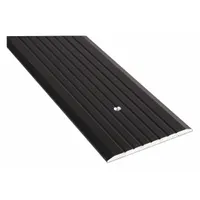 This heavy-duty aluminum threshold is 6 ft long with a fluted transition type. It seals the gap under commercial or industrial doors to block drafts, moisture, and debris while providing a slip-resistant surface for foot and cart traffic