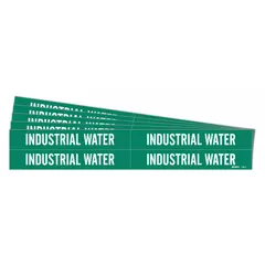 Green adhesive pipe marker with white legend reading 'Industrial Water'. Fits pipe outer diameters from 3/4 to 2-3/8 inches. Pack includes 4 markers without arrows. Used to identify water pipes in industrial facilities for safety and maintenance.