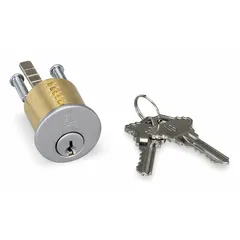 Rim-type lockset cylinder in chrome finish. Includes two keys. Used for key-operated security on rim lock assemblies in commercial or industrial doors.