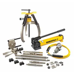 This ram puller set includes a hand pump and gauge adaptor assembly. It is used for removing press-fit components such as bearings, gears, and pulleys in industrial maintenance and repair applications. The set features a 10 ton cylinder nominal capacity.
