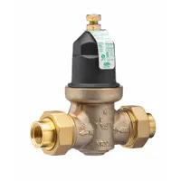 This cast bronze water pressure regulator reduces and stabilizes incoming water pressure to protect downstream plumbing fixtures and piping. It features a double union design for easy installation and service, with an adjustable pressure range of 15 to 75 psi. The 1/2 inch FNPT connections and low-lead compliance make it suitable for potable water systems