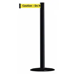 This retractable belt post barrier features a cast iron base and a black plastic post. The yellow belt is 7 1/2 ft long and printed with 'Caution Do Not Enter' in black. Used to cordon off restricted areas and guide pedestrian traffic in industrial facilities, warehouses, and public spaces.
