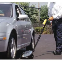 Rolling inspection mirror with an 18-inch diameter round glass mirror mounted on a metal frame with wheels. Designed for under-vehicle or hard-to-reach area inspections in automotive, security, and facility maintenance applications