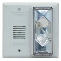Wall-mount horn alarm with xenon strobe light for audible and visual signaling. Operates on 24 V AC. Overall length 4 1/2 in, width 4 9/16 in. Suitable for fire, evacuation, or process alarms in industrial settings