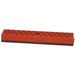 This socket tray is made of red polypropylene and measures 7 inches overall width. It features 37 posts/slots for organizing standard and deep sockets. A magnetic back allows secure attachment to metal toolboxes, workbenches, or other ferrous surfaces for convenient access in workshops and garages.