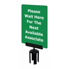 Green acrylic sign with the message 'Please Wait Here For The Next Available Associate.' Includes a mounting adapter for use with Tensabarrier posts. Commonly used in queue management and customer flow applications.