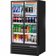 This refrigerated merchandiser features a black swing glass door and uses R-290 refrigerant. Dimensions: 54 7/8 in x 30 7/8 in x 21 3/8 in. Suitable for commercial food and beverage display in retail and foodservice environments.