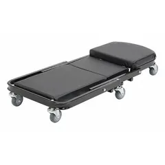 Steel convertible creeper with adjustable height range of 7 1/2 to 18 1/2 in and 450 lb max load capacity. Includes headrest and body cushion. Suitable for vehicle and machinery maintenance tasks requiring a mobile work platform.