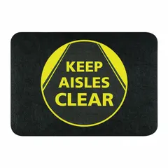 This polypropylene floor mat measures 24 inches by 17 inches and is 1/8 inch thick. It features an adhesive backing for secure placement on indoor floors. The black mat is used to designate walkways and aisles, helping to maintain clear pedestrian paths and support workplace safety.