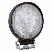 This GROTE LED floodlight features a black housing, bracket mount, and blunt cut wires for electrical connection. It provides wide-area illumination for heavy-duty vehicles such as garbage trucks and tow trucks during loading, towing, and maintenance operations
