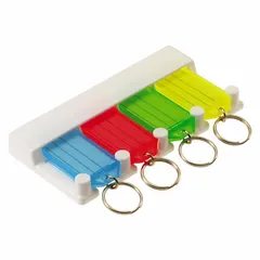 Green key tag rack with a 4-key capacity. Measures 2-1/2 inches high, 5 inches wide, and 1/2 inch deep. Used for organizing and storing keys in a compact wall-mounted rack for quick access and inventory control.