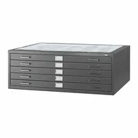 This flat file cabinet from SAFCO PRODUCTS features five drawers for organized storage of large-format documents, blueprints, maps, and artwork. Constructed with a black powder-coated steel finish, it measures 16 1/2 inches in overall height and 35 3/8 inches in overall depth. Suitable for use in offices, studios, and drafting rooms where flat filing is required