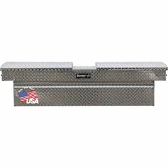 This crossover box features a gull wing lid and is constructed of aluminum with a silver finish. It has an overall width of 71 inches. Designed for mounting across truck beds, it provides lockable storage for tools and equipment in service vehicles.