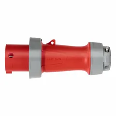 This LEVITON pin and sleeve plug is washdown-rated for use in environments exposed to moisture and debris. It is rated for 277/480V AC, three-phase, 100 A, with 4 poles and 5 wires, and features IEC grounding. Typical applications include industrial power connections in manufacturing, food processing, and outdoor settings.