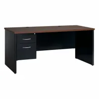 This HIRSH single pedestal desk features a walnut melamine laminate desktop with a particleboard core, supported by a black steel frame. It includes one pedestal with two drawers for storage and a modesty panel. Suitable for office or industrial workspace use