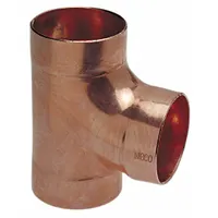 This NIBCO sweat tee is a wrot copper fitting for drain, waste, and vent (DWV) systems. It features three cup ends sized 1 1/4 in CTS, allowing a 90-degree branch connection between copper pipes. Installation requires soldering to create leak-proof joints in residential and commercial plumbing